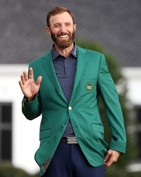 Dustin Johnson in his green jacket after winning the masters